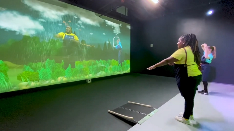 Children interacting with a climate-themed digital display at the National Children's Museum climate lab