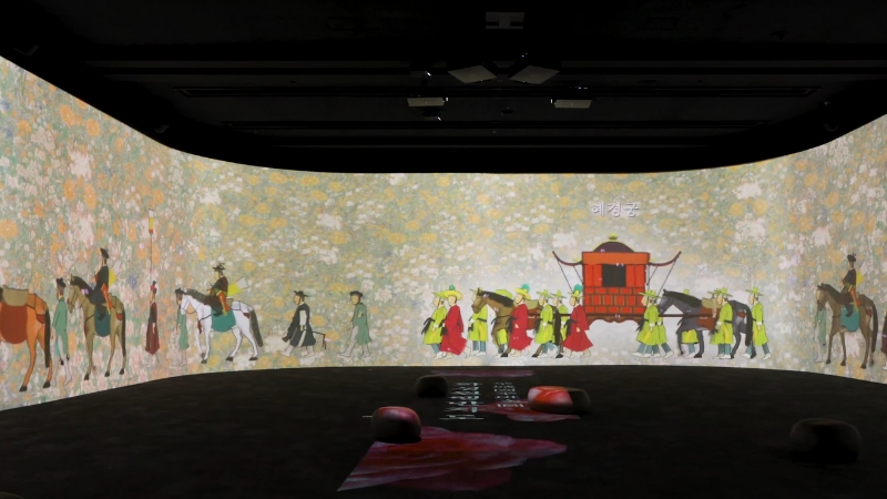 A digital projection at the National Museum of Korea displays a traditional Korean procession using augmented reality