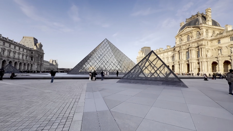 Glass pyramids stand in the main courtyard of the Louvre Museum in Paris
