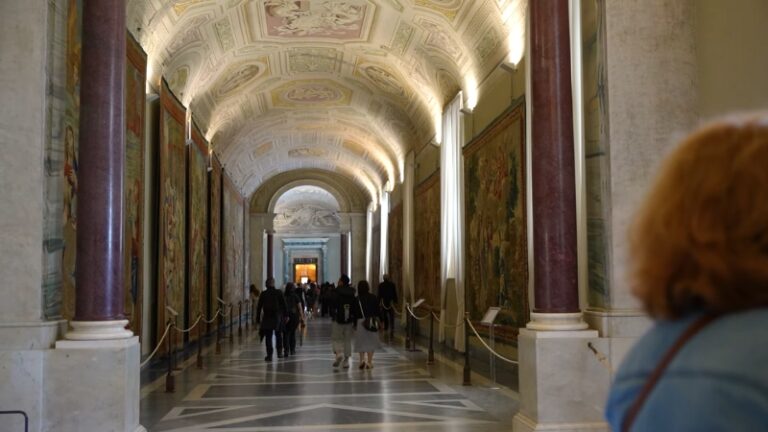 Visitors walk through an ornate hallway in the Vatican Museums, one of the world’s most famous virtual museums